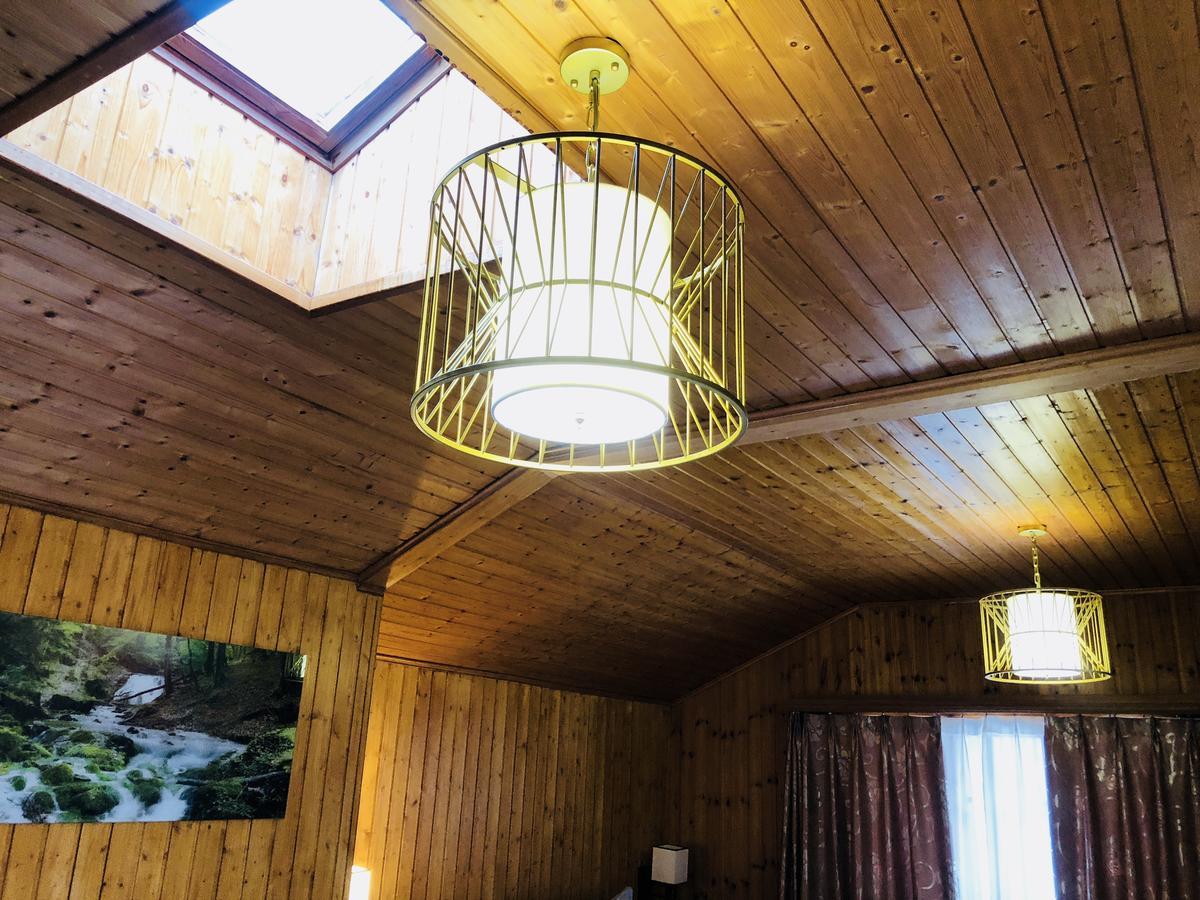 Qi-Lin Hotel Restaurant Ayer Dış mekan fotoğraf