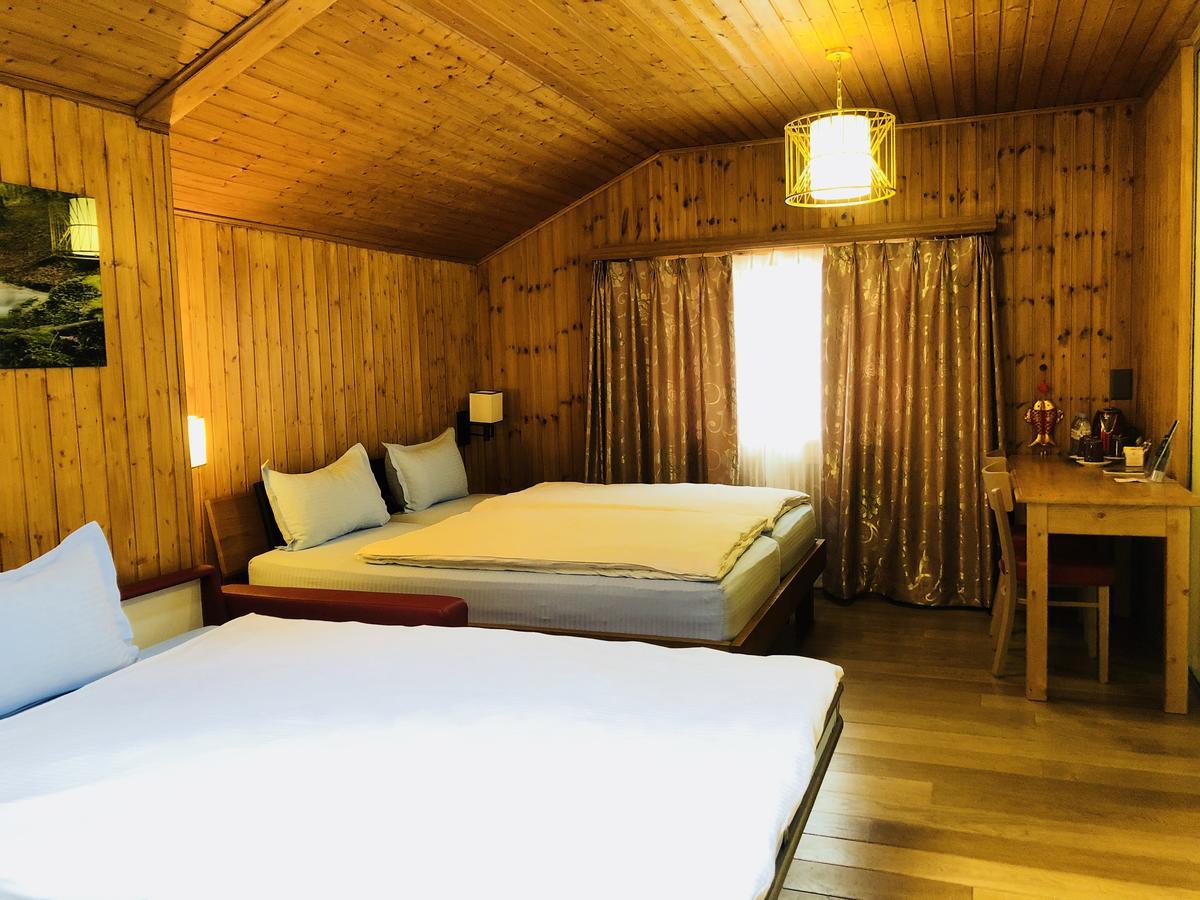 Qi-Lin Hotel Restaurant Ayer Dış mekan fotoğraf