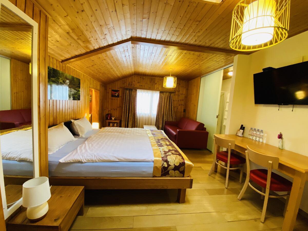 Qi-Lin Hotel Restaurant Ayer Dış mekan fotoğraf