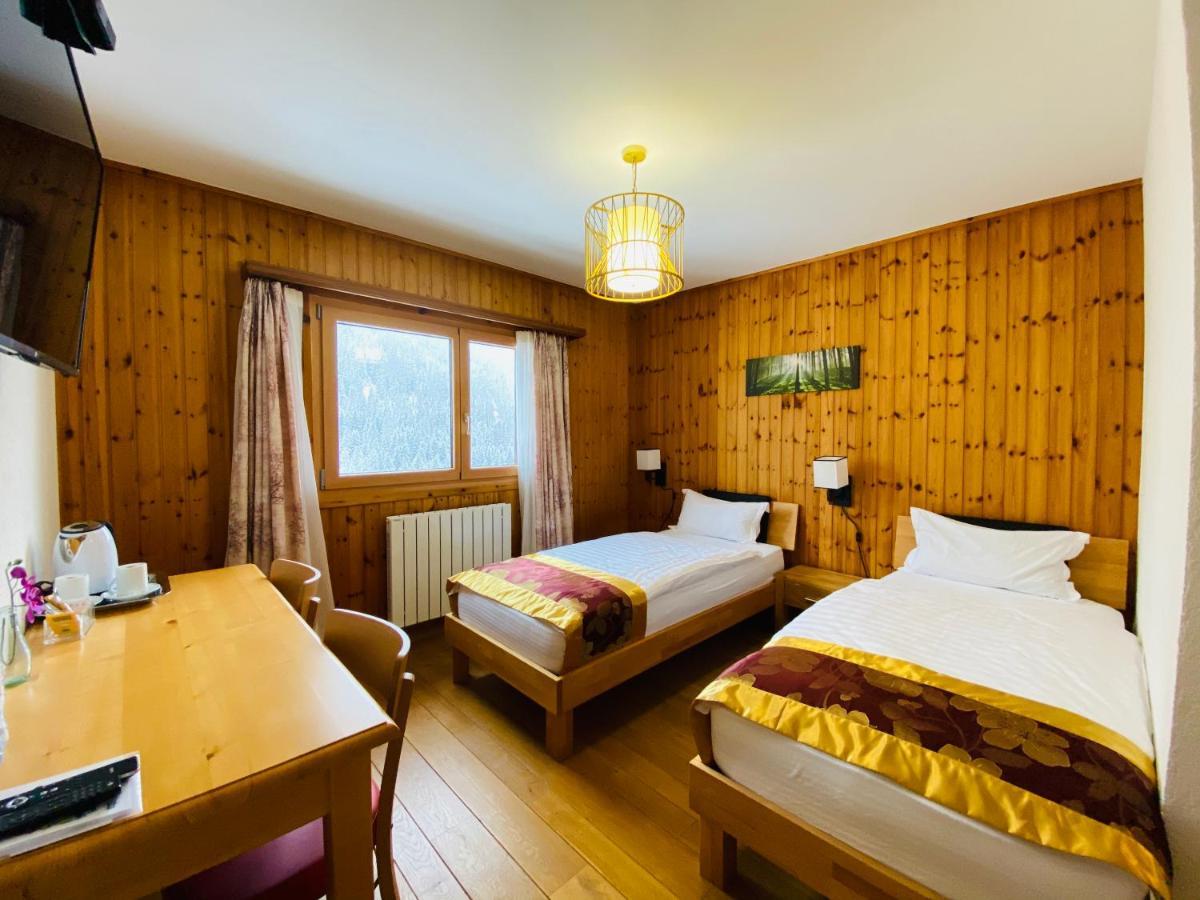Qi-Lin Hotel Restaurant Ayer Dış mekan fotoğraf