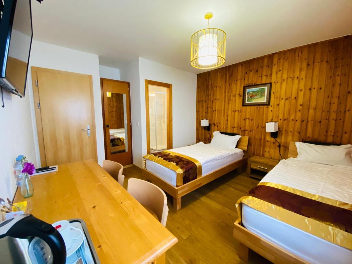 Qi-Lin Hotel Restaurant Ayer Dış mekan fotoğraf
