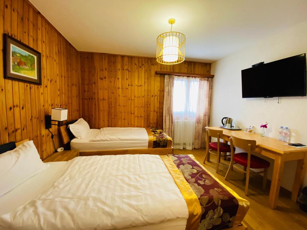 Qi-Lin Hotel Restaurant Ayer Dış mekan fotoğraf